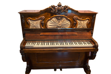 Fototapeta na wymiar Piano vintage isolated on a white background. Musical instrument.