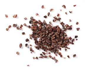Chopped cocoa pile isolated on white background, top view