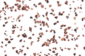 Chopped cocoa pile isolated on white background, top view