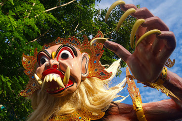 Ogoh ogoh, traditional mask-statue  of bad spirit,during nyepi carnival parade in bali- Indonesia
