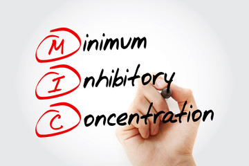 Fototapeta premium MIC - Minimum Inhibitory Concentration acronym with marker, concept background
