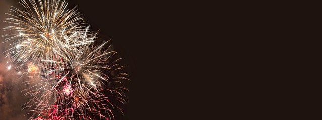 Fireworks on dark brown background for anniversary, new year and festivals