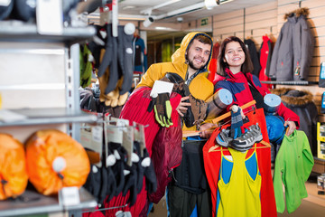 Smiling family demonstration new tourist assortiment