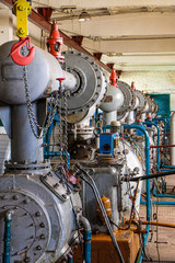 Industrial compressor station room. Air blower pumps.