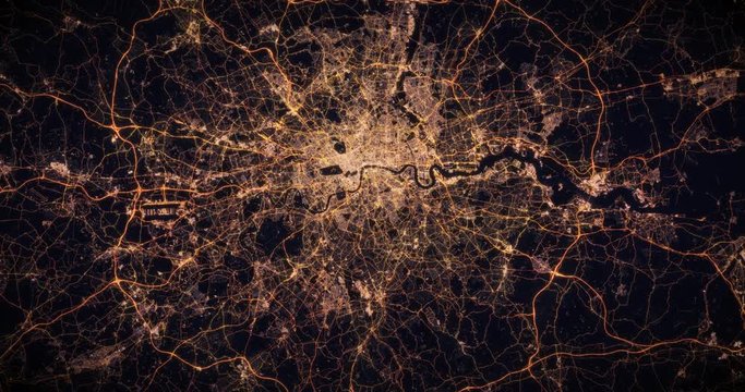 Aerial night view of city of London, UK. Traffic and street light glowing. Camera flying high above, moving closer and rotating from space filming cinematic straight down. 3d animation rendering.