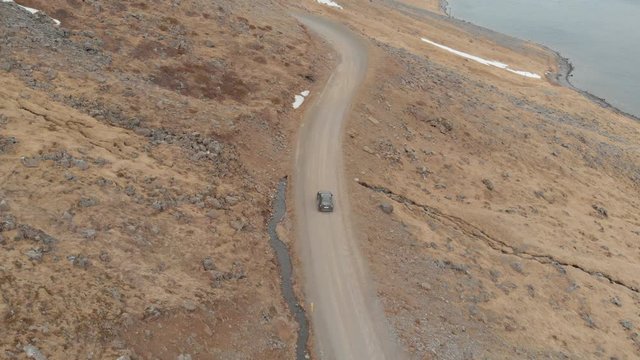 Drone follows car through breathtaking scenery