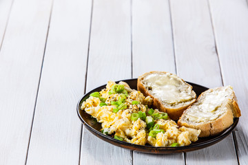 Scrambled eggs with sandwiches
