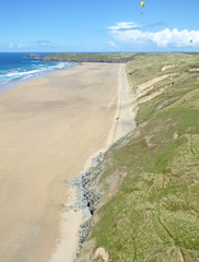 Paragliders above Perranporth Beach