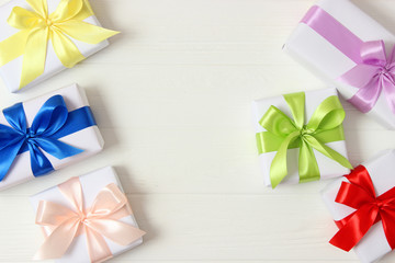 gifts on a colored background top view. Holiday, giving presents, birthday.