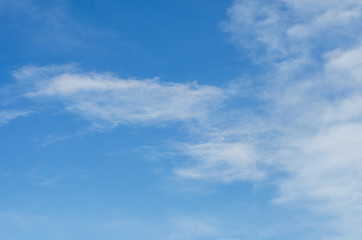 cirrus clouds on a background of blue sky