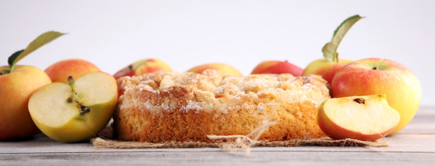 Apple pie or homemade cake with apples on wood. Delicous dessert apple tart