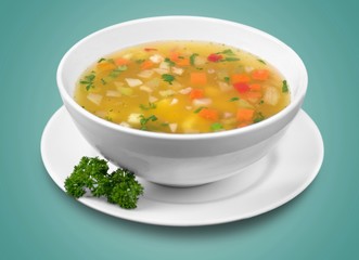 Bowl of delicious vegetables soup on  table