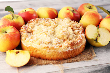 Apple pie or homemade cake with apples on wood. Delicous dessert apple tart