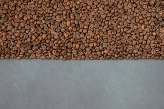coffee beans lie on a beautiful background © Stanislav