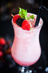 fresh forest fruit lemonade - blueberry, raspberry, blackberry with smashed ice, ginger and honey