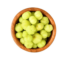 star gooseberry in wood bowl on white background