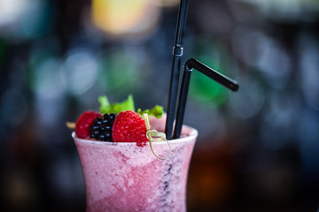 fresh forest fruit lemonade - blueberry, raspberry, blackberry with smashed ice, ginger and honey