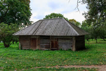 Old wooden house made of logs in a Russian village in summer. Russia, Tula, Yasnaya Polyana.