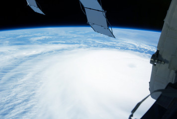 Huge typhoon, view from space, from a space station.  Elements of this image were furnished by NASA