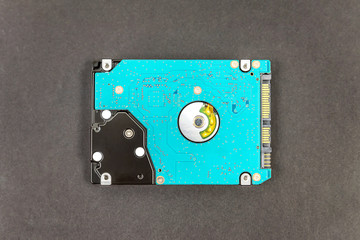 hdd 2.5 hard drive disk on dark background closeup overhead view