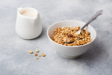 Healthy breakfast. Fresh granola, muesli with yogurt on grey background. Copy space