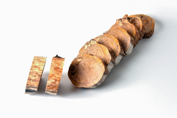 Cross sections of a tree trunk for design. Preparation of elements for decoration.