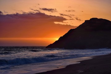 Beautiful colorful sunset viewed from the beach -  pacific coast near San Francisco, United States of America