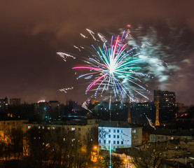 Firework on New Year's Eve over the city.