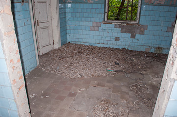 Blue room with the doorway and windows in the abandoned chemical laboratory