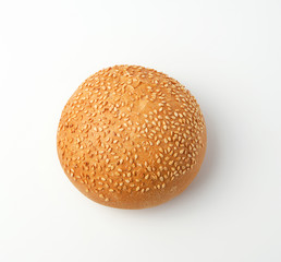 baked whole round bun with sesame seeds made from white wheat flour