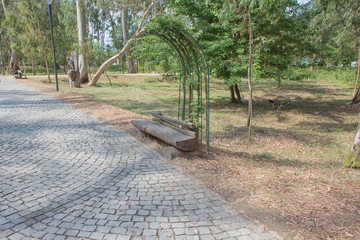Beautiful park with pathway, arbors and benches