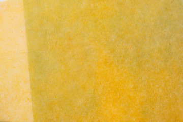 Obraz na płótnie Canvas 背景素材　和紙　黄色