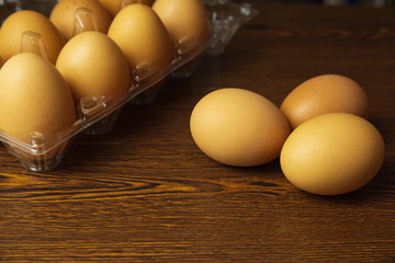Fresh egg and eggs on plastic box