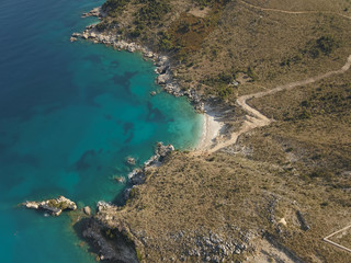 Beautiful seascape. Beach on coast of Ionian Sea in Albania, Ksamil, near Greece island Korfu. Birdseye view of Mirror Beach (Pasqyra) in Saranda, Albania (Albanian Riviera) View from drone
