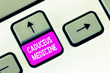 Writing note showing Caduceus Medicine. Business photo showcasing symbol used in medicine instead...