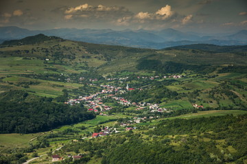 Fototapeta na wymiar ROMANIA ,Bistrita view from the plane,Slatinita,Pintic,august 2019