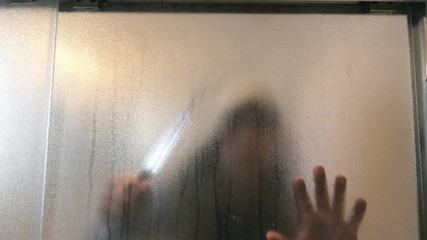 Man sneaking with knife in the bathroom in 4K