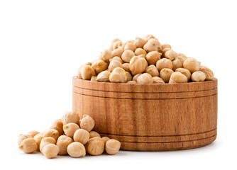 Chickpeas in wooden plate on a white background.