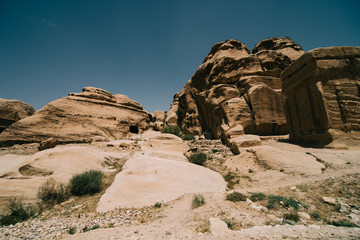 Jordan - May, 2019: View from road to Monastery in Petra Jordan. Mountains, blue sky