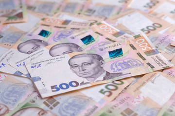Obraz na płótnie Canvas Ukrainian banknotes value of 500 hryvnias UAH closeup.