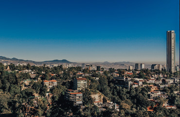 panoramic view Mexico city at sunny day blue sky winter