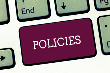 Writing note showing Policies. Business photo showcasing course or principle of action adopted or...