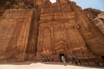 JORDAN, Petra - May 2019: Tourist complex of the ancient city of Petra with tourists and locals