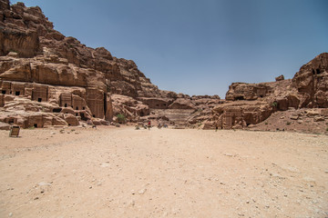 JORDAN, Ancient Petra - May, 2019:Tourist complex of the ancient city of Petra with tourists and locals