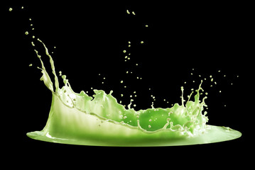green paint splash isolated on black background