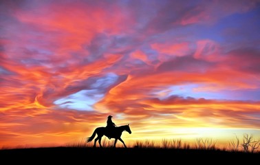 Obraz na płótnie Canvas Lonely cowboy against the evening sky