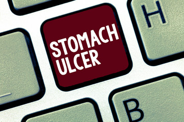 Handwriting text Stomach Ulcer. Concept meaning Open sores that develop on the inside lining of...