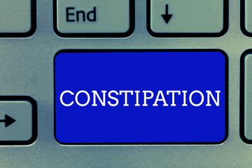 Handwriting text Constipation. Concept meaning Bowel movements that are erratic Trouble in clearing the bowels.