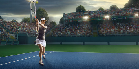 Female athlete plays tennis on a professional court