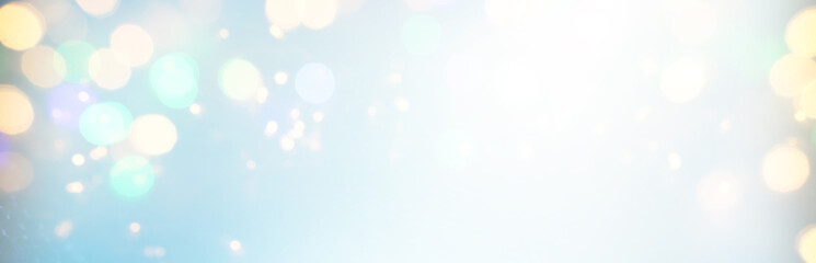 blackground of abstract glitter lights. blue, gold and silver. de focused